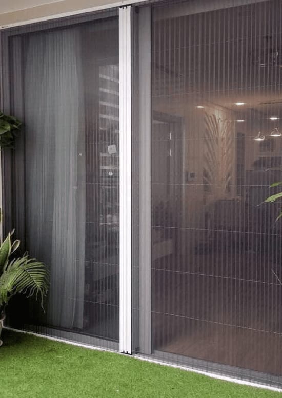 Premium pleated mosquito mesh door installation in Lucknow by Mac Solutions